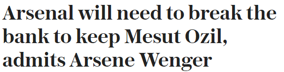 arsene-wenger-mesut-ozil-telegraph