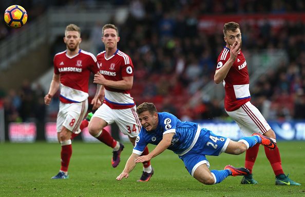 MIDDLESBROUGH, ENGLAND - OCTOBER 29: Ryan Fraser of AFC Bournemouth (C) is fouled by Calum Chambers of Middlesbrough (R) during the Premier League match between Middlesbrough and AFC Bournemouth at the Riverside Stadium on October 29, 2016 in Middlesbrough, England.
