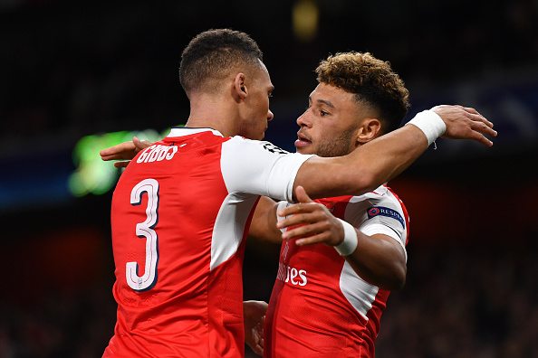 LONDON, ENGLAND - OCTOBER 19: Alex Oxlade-Chamberlain of Arsenal celebrates with team mate Kieran Gibbs after scoring his team's third goal of the game during the UEFA Champions League group A match between Arsenal FC and PFC Ludogorets Razgrad at the Emirates Stadium on October 19, 2016 in London, England. (Photo by Mike Hewitt/Getty Images)