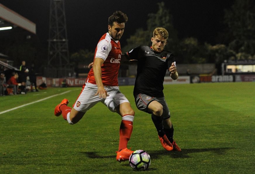 BOREHAMWOOD, ENGLAND - OCTOBER 12: Carl Jenkinson of Arsenal takes on Siph Mdlalose of Southampton during the match between Arsenal U23 and Southampton U23 at Meadow Park on October 14, 2016 in Borehamwood, England. (Photo by David Price / Getty Images)