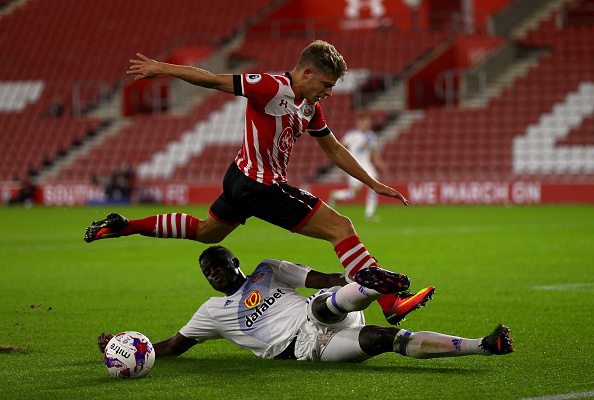 SOUTHAMPTON, ENGLAND - OCTOBER 26: Lloyd Isgrove of Southampton (L) is tackled by Papy Djilobodji of Sunderland (R) during the EFL Cup fourth round match between Southampton and Sunderland at St Mary's Stadium on October 26, 2016 in Southampton, England. (Photo by Ian Walton/Getty Images)