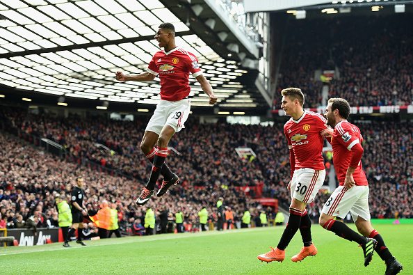 MANCHESTER, ENGLAND - FEBRUARY 28: Marcus Rashford of Manchester United celebrates scoring his opening goal during the Barclays Premier League match between Manchester United and Arsenal at Old Trafford on February 28, 2016 in Manchester, England. (Photo by Laurence Griffiths/Getty Images)