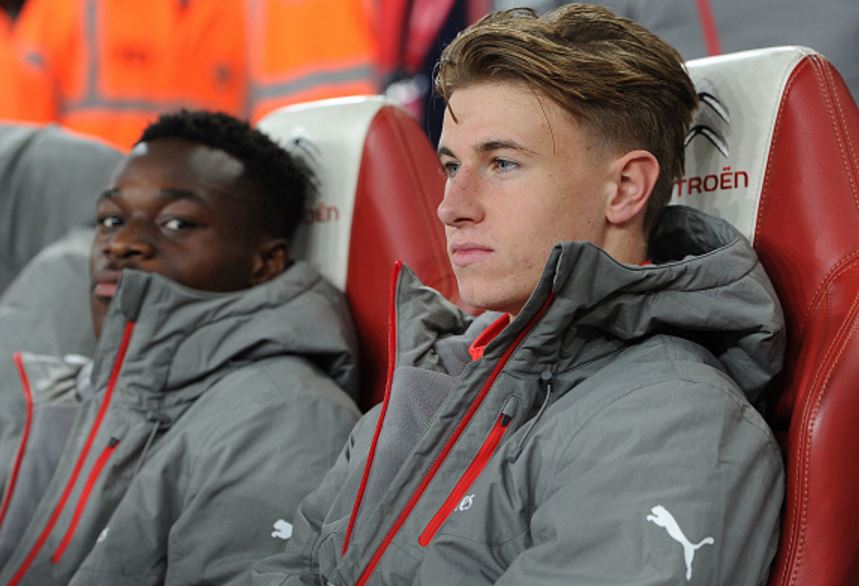 LONDON, ENGLAND - OCTOBER 25: Ben Sheaf of Arsenal (R) on the substitutes' bench before the first-team's EFL Cup fixture against Reading. The talented teenager continues to improve with the u23's and it seems only a matter of time before he is afforded a first-team opportunity. (Photo by David Price / Arsenal FC via Getty Images) 