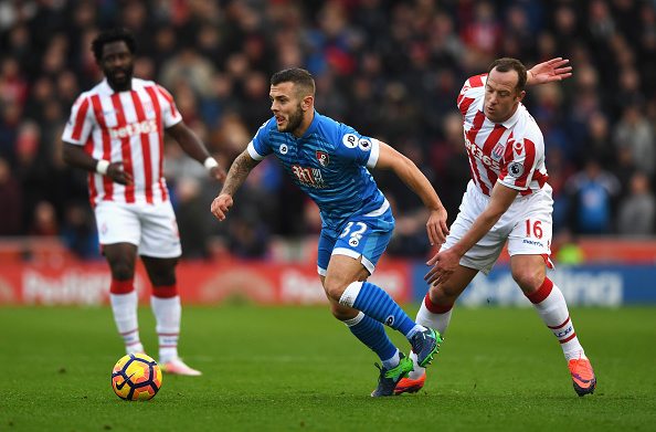 STOKE ON TRENT, ENGLAND - NOVEMBER 19: Jack Wilshere of AFC Bournemouth (L) is tackled by Charlie Adam of Stoke City (R) during the Premier League match between Stoke City and AFC Bournemouth at Bet365 Stadium on November 19, 2016 in Stoke on Trent, England. (Photo by Gareth Copley/Getty Images)