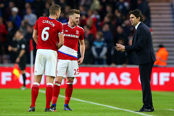MIDDLESBROUGH, ENGLAND - DECEMBER 17: Aitor Karanka, Manager of Middlesbrough (R) speaks to Ben Gibson of Middlesbrough (L) and Calum Chambers of Middlesbrough (C) during the Premier League match between Middlesbrough and Swansea City at Riverside Stadium on December 17, 2016 in Middlesbrough, England.