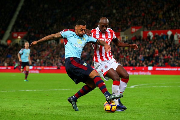 STOKE ON TRENT, ENGLAND - DECEMBER 03: Andre Gray of Burnley and Bruno Martins Indi of Stoke City battle for the ball during the Premier League match between Stoke City and Burnley at Bet365 Stadium on December 3, 2016 in Stoke on Trent, England. (Picture source: Getty Images)