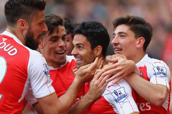 LONDON, ENGLAND - MAY 15: Mikel Arteta of Arsenal is congratulated by team mates after scoring to make it 4-0 during the Barclays Premier League match between Arsenal and Aston Villa at the Emirates Stadium on May 15, 2016 in London, England. (Photo by Julian Finney/Getty Images)