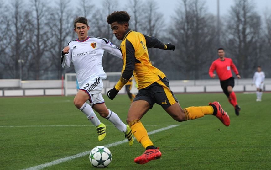 BASEL, SWITZERLAND - DECEMBER 06: Reiss Nelson (R) was a constant attacking threat as usual with his direct running causing Basel's backline a number of problems throughout. (Photo: David Price / Arsenal FC)