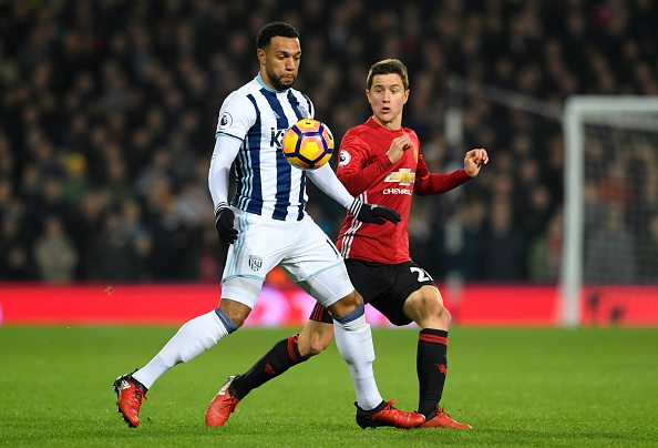 WEST BROMWICH, ENGLAND - DECEMBER 17: Matt Phillips of West Bromwich Albion (L) controls the ball while under pressure from Ander Herrera of Manchester United (R) during the Premier League match between West Bromwich Albion and Manchester United at The Hawthorns on December 17, 2016 in West Bromwich, England. (Photo by Stu Forster/Getty Images)