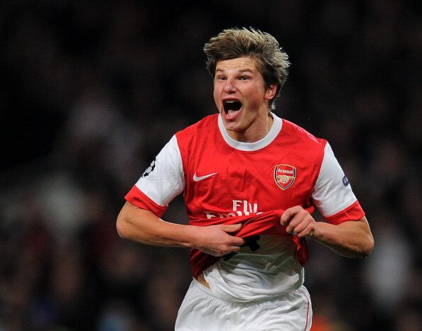Arsenal's Russian midfielder Andrey Arshavin celebrates after scoring a goal during his team's Champions League round of 16, 1st leg football match against FC Barcelona on February 16, 2011 at the Emirates Stadium in London. AFP PHOTO/LLUIS GENE. (Photo credit should read LLUIS GENE/AFP/Getty Images)