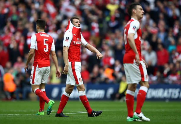 Ramsey (pictured, centre) in action against City
