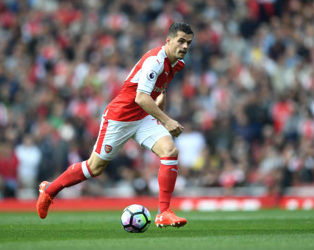Xhaka (pictured) in action advancing with the ball against Manchester United