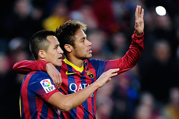 Alexis Sanchez L of FC Barcelona celebrates with his teammate Neymar