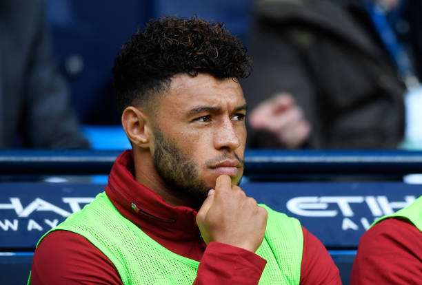 MANCHESTER, ENGLAND - SEPTEMBER 09: Alex Oxlade-Chamberlain of Liverpool looks on from the bench during the Premier League match between Manchester City and Liverpool at Etihad Stadium on September 9, 2017 in Manchester, England. (Photo by Stu Forster/Getty Images)