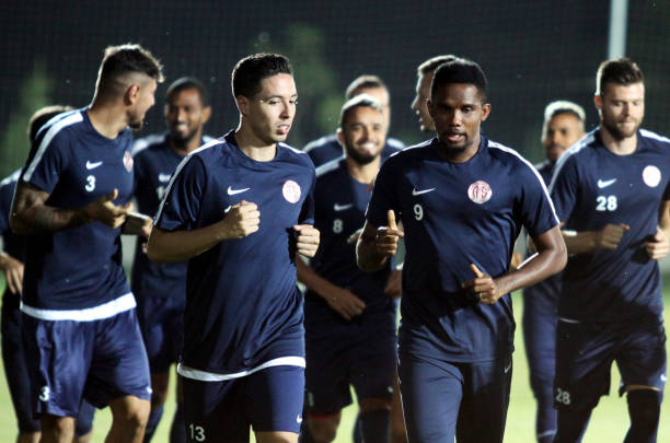 Antalyaspor's new French midfielder Samir Nasri (L) runs next to Antalyaspor's Cameroonian forward Samuel Eto'o (R) during his first pratice session after his signing ceremony in Antalya, on August 22, 2017.  (STR/AFP/Getty Images)