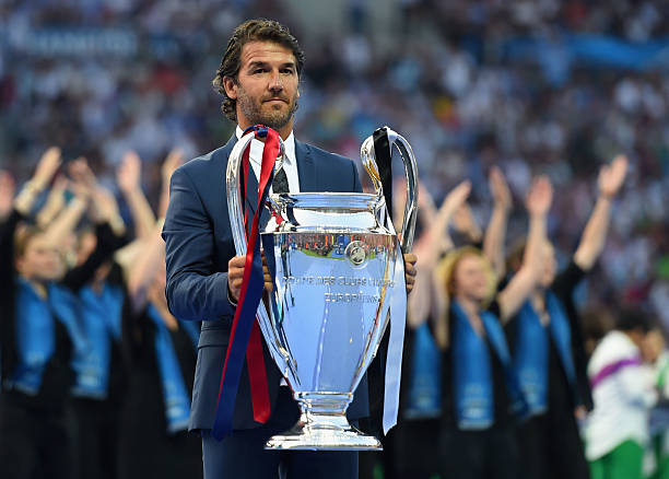 BERLIN, GERMANY - JUNE 06: Former German footballer Karl-Heinz Riedle holds the Champions League trophy during the UEFA Champions League Final between Juventus and FC Barcelona at Olympiastadion on June 6, 2015 in Berlin, Germany. (Photo by Shaun Botterill/Getty Images)