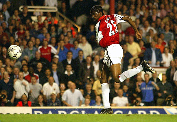 24 Apr 2002: Kanu of Arsenal scores the second goal during the FA Barclaycard Premiership match between Arsenal and West Ham United at Highbury, London. DIGITAL IMAGE Credit: Ben Radford/Getty Images