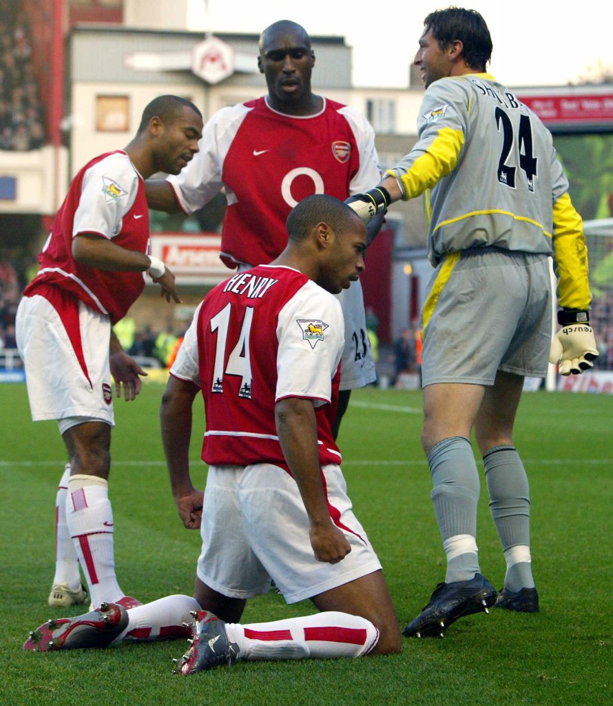 LONDON, UNITED KINGDOM: Arsenal's Thierry Henry (C) is congratulated by team mates from left Ashley Cole, Sol Campbell and Rami Shaaban after scoring against Tottenham during a premier league match at Highbury Stadium in north London, 16 November 2002. AFP PHOTO/ODD ANDERSEN - - ONLINE INTERNET USE SUBJECT TO FAPL LICENSE - - (Photo credit should read Odd Andersen/AFP/Getty Images)