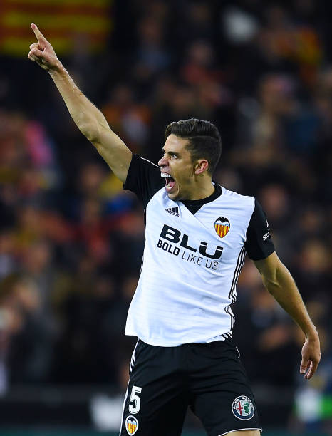 VALENCIA, SPAIN - NOVEMBER 26: Gabriel Paulista of Valencia CF celebrates after his team mate Rodrigo Moreno scored his team's first goal during the La Liga match between Valencia and Barcelona at Mestalla stadium on November 26, 2017 in Valencia, Spain. (Photo by David Ramos/Getty Images)