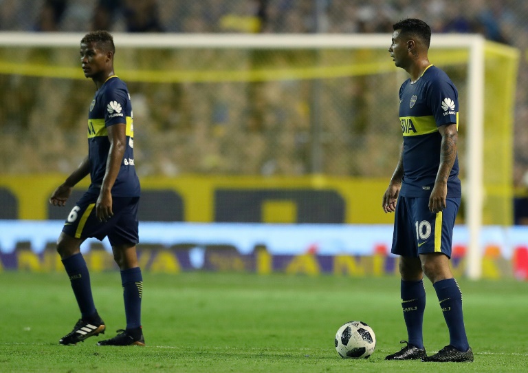 Colombians midfielders Edwin Cardona (R) and Wilmar Barrios, who play for one of Argentina's storied teams, Boca Juniors, are accused of assaulting and threatening two women AFP/File / ALEJANDRO PAGNI