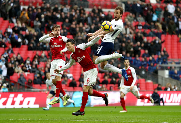 LONDON, ENGLAND - FEBRUARY 10: Harry Kane of Tottenham Hotspur scores his side's first goal during the Premier League match between Tottenham Hotspur and Arsenal at Wembley Stadium on February 10, 2018 in London, England. (Photo by Catherine Ivill/Getty Images)