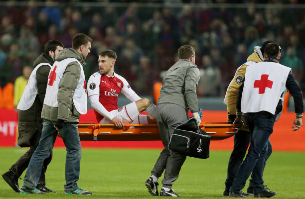 MOSCOW, RUSSIA - APRIL 12: Aaron Ramsey of Arsenal is stretchered from the pitch during the UEFA Europa League quarter final leg two match between PFC CSKA Moskva and Arsenal FC at CSKA Arena stadium on April 12, 2018 in Moscow, Russia. (Photo by Oleg Nikishin/Getty Images)