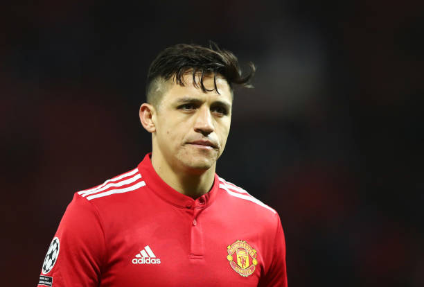 MANCHESTER, ENGLAND - MARCH 13: Alexis Sanchez of Manchester United looks dejected in defeat after the UEFA Champions League Round of 16 Second Leg match between Manchester United and Sevilla FC at Old Trafford on March 13, 2018 in Manchester, United Kingdom. (Photo by Clive Mason/Getty Images)
