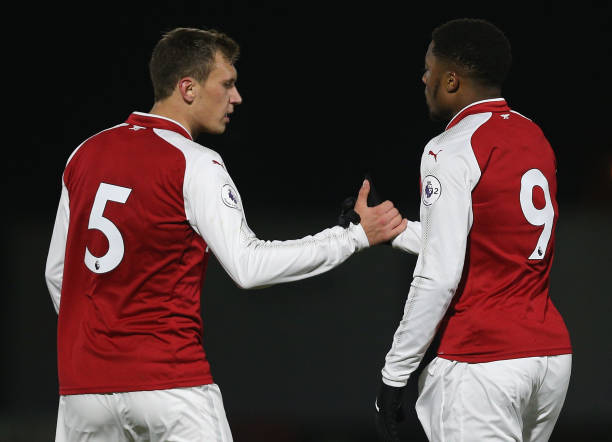 BOREHAMWOOD, ENGLAND - DECEMBER 15: Chuba Akpom of Arsenal celebrates after scoring his sides first goal with Krystian Bielik of Arsenal during the Premier League 2 match between Arsenal and Derby County at Meadow Park on December 15, 2017 in Borehamwood, England. (Photo by James Chance/Getty Images)