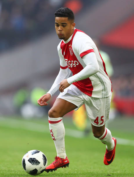 AMSTERDAM, NETHERLANDS - JANUARY 21: Justin Kluivert of Ajax runs with the ball during the Dutch Eredivisie match between Ajax Amsterdam and Feyenoord at Amsterdam ArenA on January 21, 2018 in Amsterdam, Netherlands. (Photo by Dean Mouhtaropoulos/Getty Images)