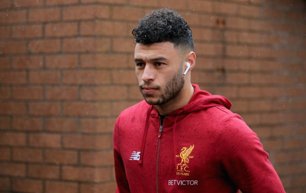 BURNLEY, ENGLAND - JANUARY 01: Alex Oxlade-Chamberlain of Liverpool arrives at the stadium prior to the Premier League match between Burnley and Liverpool at Turf Moor on January 1, 2018 in Burnley, England. (Photo by Nigel Roddis/Getty Images)