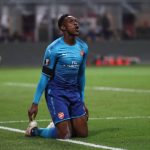 MILAN, ITALY - MARCH 08: Danny Welbeck of Arsenal reacts after team-mate Aaron Ramsey scores during the UEFA Europa League Round of 16 match between AC Milan and Arsenal at the San Siro on March 8, 2018 in Milan, Italy. (Photo by Catherine Ivill/Getty Images)