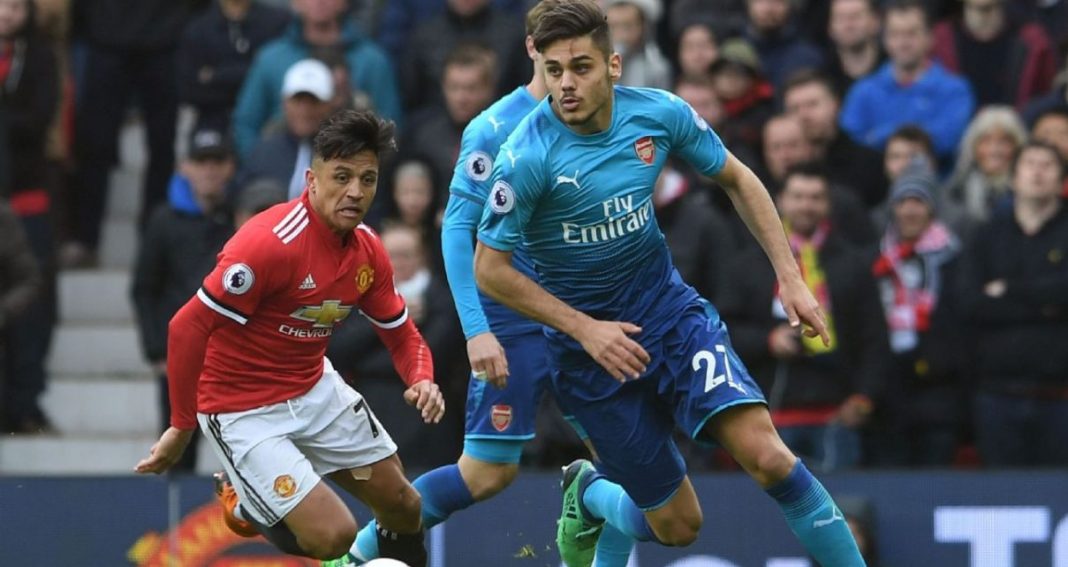 Konstantinos Mavropanos and Alexis Sanchez during Arsenal's clash with Manchester United at Old Trafford in the 2017/18 season