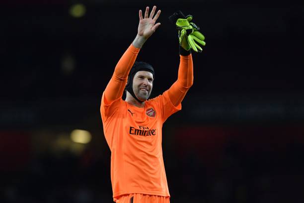 Arsenal's Czech goalkeeper Petr Cech gestures on the pitch after the UEFA Europa League first leg quarter-final football match between Arsenal and CSKA Moscow at the Emirates Stadium in London on April 5, 2018. Arsenal won the game 4-1. / AFP PHOTO / Ben STANSALL