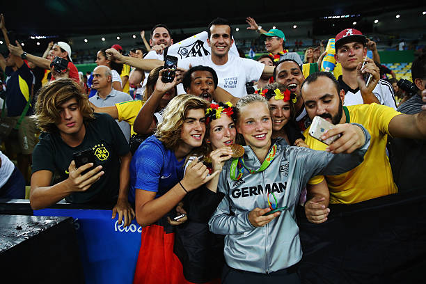 RIO DE JANEIRO, BRAZIL - AUGUST 19: Tabea Kemme of Germany celebrates with fans following victory during the Women's Olympic Gold Medal match between Sweden and Germany at Maracana Stadium on August 19, 2016 in Rio de Janeiro, Brazil. (Photo by Clive Brunskill/Getty Images)