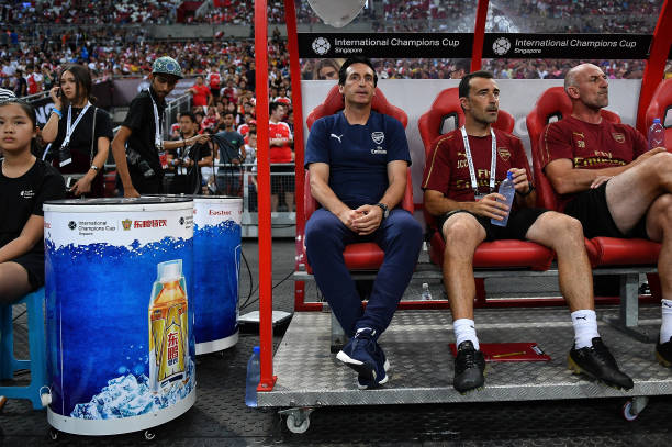 SINGAPORE - JULY 28: Unai Emery head coach of Arsenal sits during the International Champions Cup match between Arsenal and Paris Saint Germain at the National Stadium on July 28, 2018 in Singapore. (Photo by Thananuwat Srirasant/Getty Images for ICC)