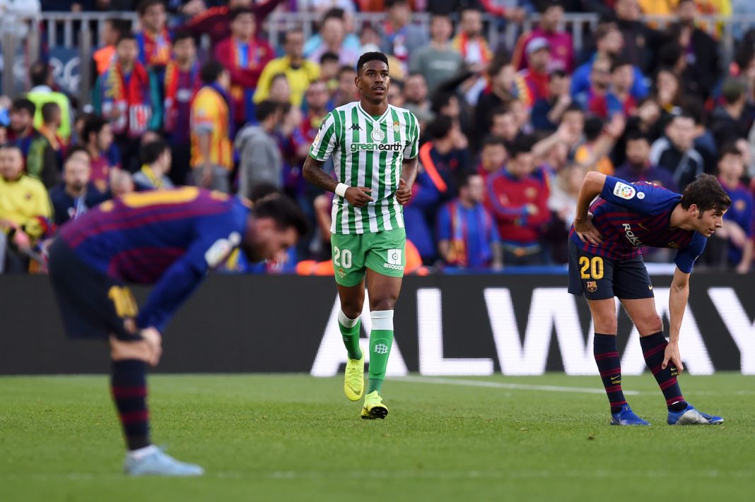 BARCELONA, SPAIN - NOVEMBER 11: Junior Firpo of Real Betis (C) celebrates after scoring his team's first goal during the La Liga match between FC Barcelona and Real Betis Balompie at Camp Nou on November 11, 2018 in Barcelona, Spain. (Photo by Alex Caparros/Getty Images)