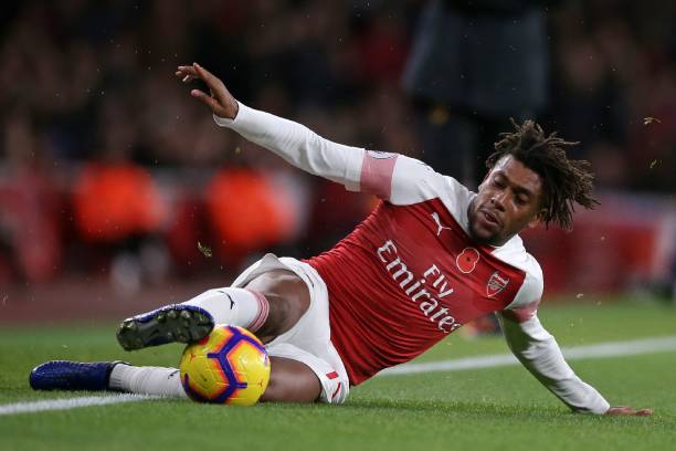 Arsenal's Nigerian striker Alex Iwobi controls the ball during the English Premier League football match between Arsenal and Wolverhampton Wanderers at the Emirates Stadium in London on November 11, 2018. (Photo by Daniel LEAL-OLIVAS / AFP) / RESTRICTED TO EDITORIAL USE. No use with unauthorized audio, video, data, fixture lists, club/league logos or 'live' services. Online in-match use limited to 120 images. An additional 40 images may be used in extra time. No video emulation. Social media in-match use limited to 120 images. An additional 40 images may be used in extra time. No use in betting publications, games or single club/league/player publications. / (Photo credit should read DANIEL LEAL-OLIVAS/AFP/Getty Images)