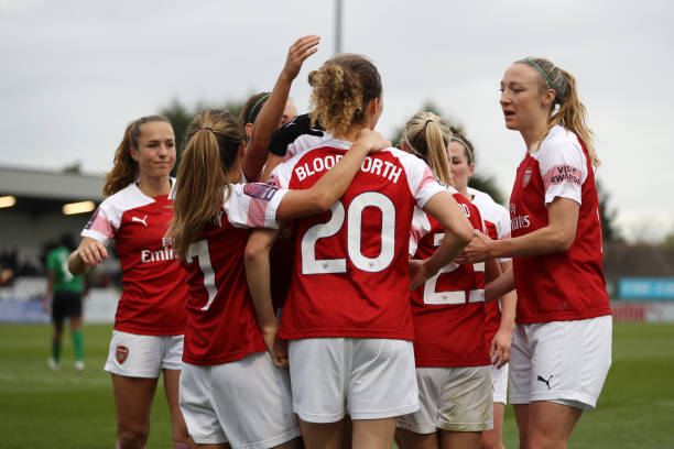 BOREHAMWOOD, ENGLAND - NOVEMBER 25: Dominique Bloodwoth of Arsenal celebrates with her team mates after scoring their team's second goal during the FA Super League match between Arsenal and Brighton and Hove Albion at Meadow Park on November 25, 2018 in Borehamwood, England. (Photo by Linnea Rheborg/Getty Images)
