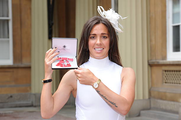 LONDON, ENGLAND - JUNE 22: England Women footballer Fara Williams poses after she received her Member of Order of the British Empire (MBE) medal from the Princess Royal during an investiture ceremony at Buckingham Palace on June 22, 2016 in London, England. (Photo by Nick Ansell-WPA Pool/Getty Images)