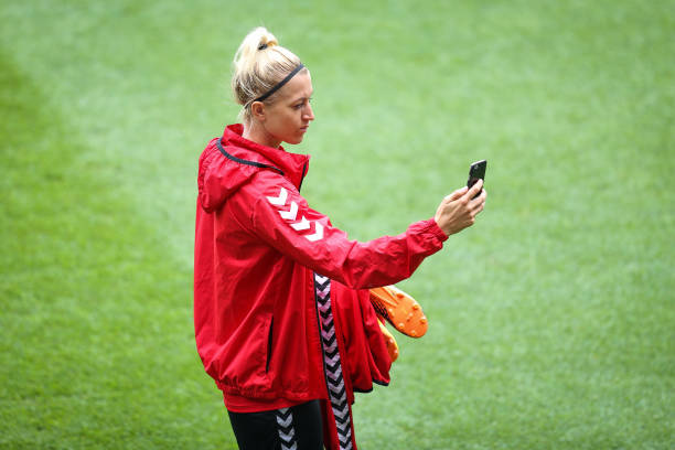 ENSCHEDE, NETHERLANDS - AUGUST 05: Janni Arnth of Denmark makes a picture during a training prior UEFA Women's Euro 2017 Final against Netherlands at De Grolsch Veste Stadium on August 5, 2017 in Enschede, Netherlands. (Photo by Maja Hitij/Getty Images)