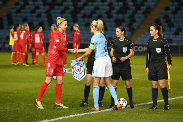 MANCHESTER, ENGLAND - MARCH 21: Steph Houghton the captain of Manchester City Women and Janni Arnth the captain of Linkoping shake hands prior to the UEFA Women's Champions League quarter final, first leg match between Manchester City Women and Linkoping at The Academy Stadium on March 21, 2018 in Manchester, England. (Photo by Alex Livesey/Getty Images)