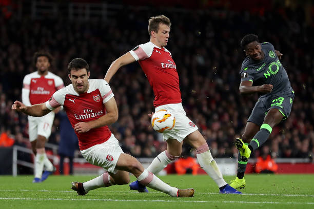 LONDON, ENGLAND - NOVEMBER 08: Abdoulay Diaby of Sporting CP is blocked by Sokratis Papastathopoulos and Rob Holding of Arsenal during the UEFA Europa League Group E match between Arsenal and Sporting CP at Emirates Stadium on November 8, 2018 in London, United Kingdom. (Photo by Richard Heathcote/Getty Images)
