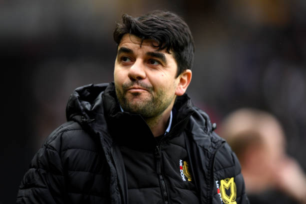 MILTON KEYNES, ENGLAND - JANUARY 27: Dan Micciche, Manager of Milton Keynes Dons looks on prior to The Emirates FA Cup Fourth Round match between Milton Keynes Dons and Coventry City at Stadium mk on January 27, 2018 in Milton Keynes, England. (Photo by Shaun Botterill/Getty Images)