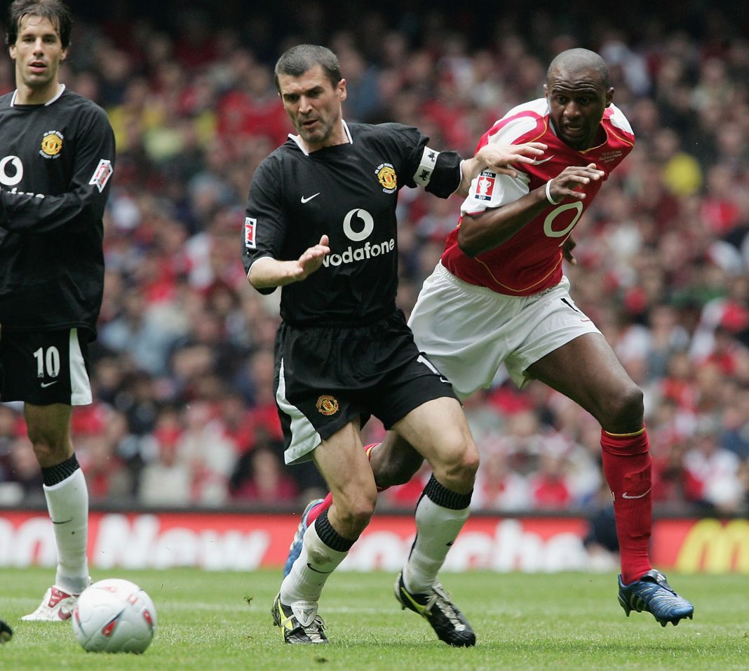 CARDIFF, WALES - MAY 21: Patrick Vieira of Arsenal and Roy Keane of Manchester United battle for the ball during the FA Cup Final between Arsenal and Manchester United at The Millennium Stadium on May 21, 2005 in Cardiff, Wales. (Photo by Phil Cole/Getty Images)