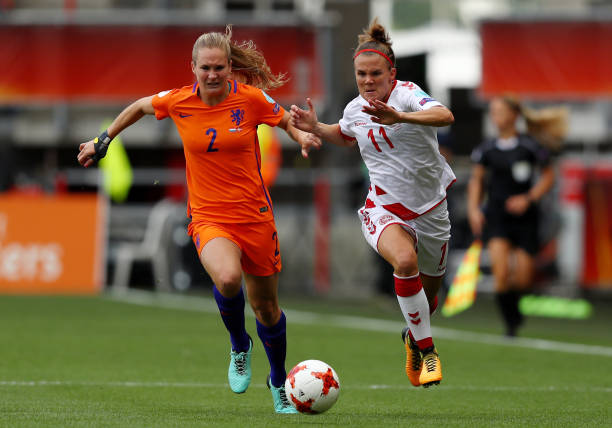 ENSCHEDE, NETHERLANDS - AUGUST 06: Katrine Veje of Denmark holds off pressure from Desiree van Lunteren of the Netherlands during the Final of the UEFA Women's Euro 2017 between Netherlands v Denmark at FC Twente Stadium on August 6, 2017 in Enschede, Netherlands. (Photo by Dean Mouhtaropoulos/Getty Images)