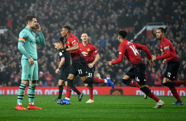 MANCHESTER, ENGLAND - DECEMBER 05: Anthony Martial of Manchester United celebrates after scoring his team's first goal during the Premier League match between Manchester United and Arsenal FC at Old Trafford on December 5, 2018 in Manchester, United Kingdom. (Photo by Michael Regan/Getty Images)