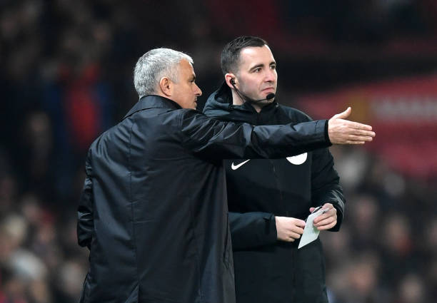 MANCHESTER, ENGLAND - DECEMBER 05: Jose Mourinho, Manager of Manchester United speaks with Fourth Official Chris Kavanagh during the Premier League match between Manchester United and Arsenal FC at Old Trafford on December 5, 2018 in Manchester, United Kingdom. (Photo by Michael Regan/Getty Images)
