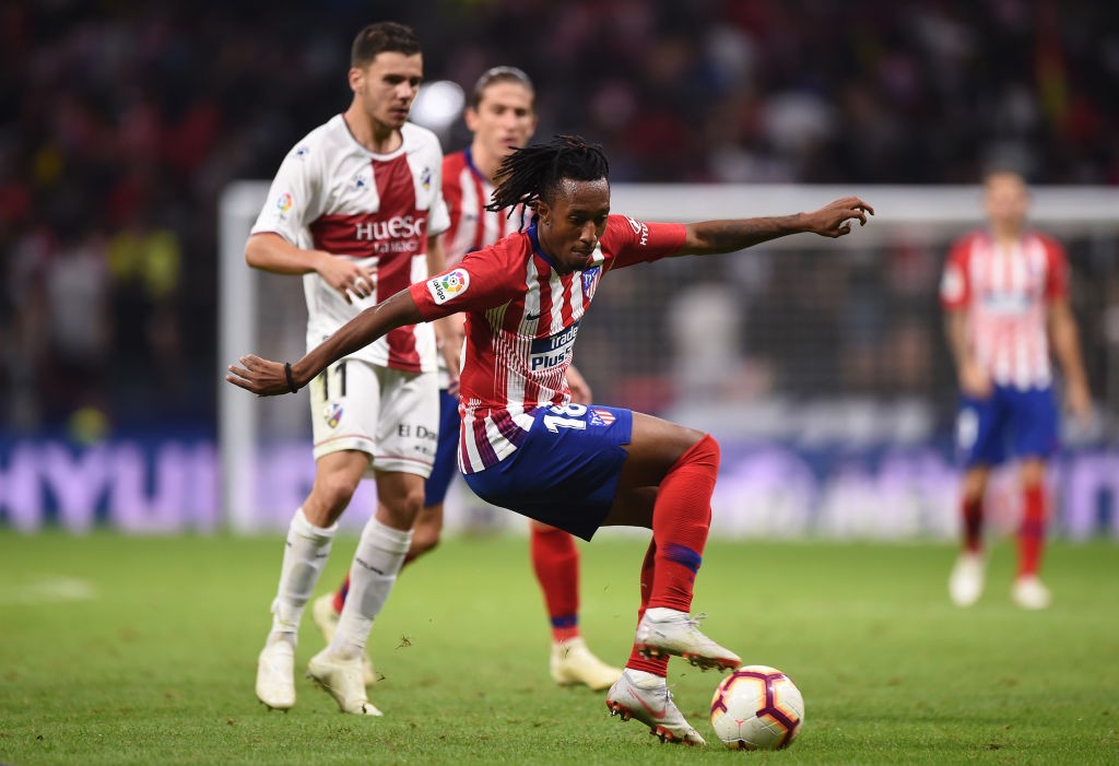 MADRID, SPAIN - SEPTEMBER 25: Gelson Martins of Club Atletico de Madrid turns from Alex Gallar of SD Huesca a during the La Liga match between Club Atletico de Madrid and SD Huesca at Wanda Metropolitano on September 25, 2018 in Madrid, Spain. (Photo by Denis Doyle/Getty Images)
