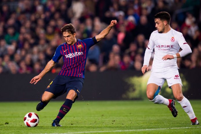 BARCELONA, SPAIN - DECEMBER 05: Denis Suarez of FC Barcelona shoots the ball under pressure from Jose Alonso of Cultural Leonesa and scores his team's second goal during the Copa del Rey fourth round second leg match between FC Barcelona and Cultural Leonesa at Camp Nou on December 05, 2018 in Barcelona, Spain. (Photo by Alex Caparros/Getty Images)
