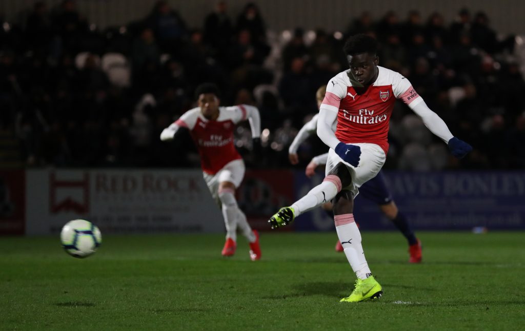 BOREHAMWOOD, ENGLAND - JANUARY 17: Bukayo Saka of Arsenal scores his sides second goal from the penalty spot during the FA Youth Cup Fourth Round between Arsenal and Tottenham Hotspur at Meadow Park on January 17, 2019 in Borehamwood, England. (Photo by Catherine Ivill/Getty Images)